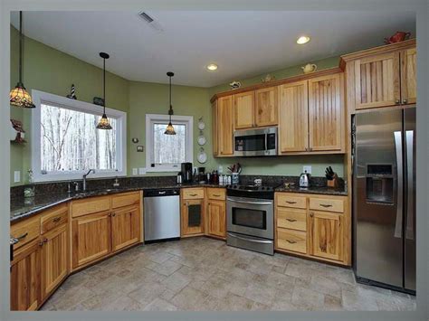 pictures of black stainless steel appliances with oak cabinets|two tone oak kitchen cabinets.